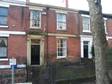 Grade II Listed mid terraced property retaining many original features and